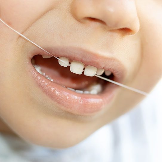 Jumpstart Your Child's Lifetime Flossing Habit - Pure Gold Professionals in Dentistry - Dentist in Redlands - Pure Gold Professionals in Dentistry - Dentist in Redlands - Dentist in Redlands